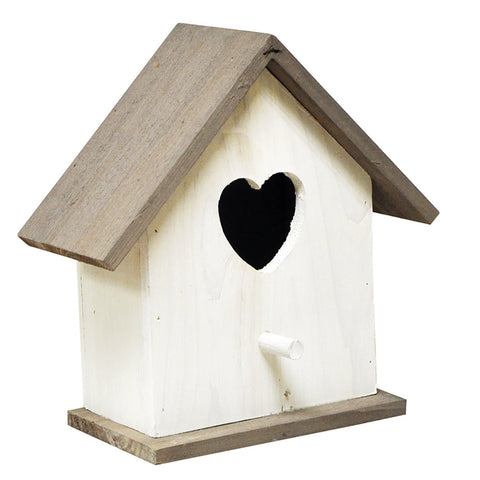 White wooden bird nest box house with heart shaped entrance hole